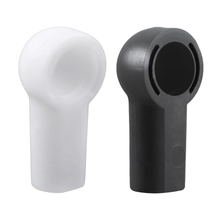 Convertible push rod bracket caps in white and black, both with circular openings