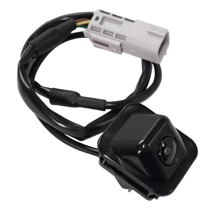 Reversing parking assist camera with black lens housing and white electrical connector