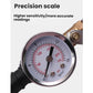 Round tire pressure gauge dial with psi and kg/cm² markings on inflation rod