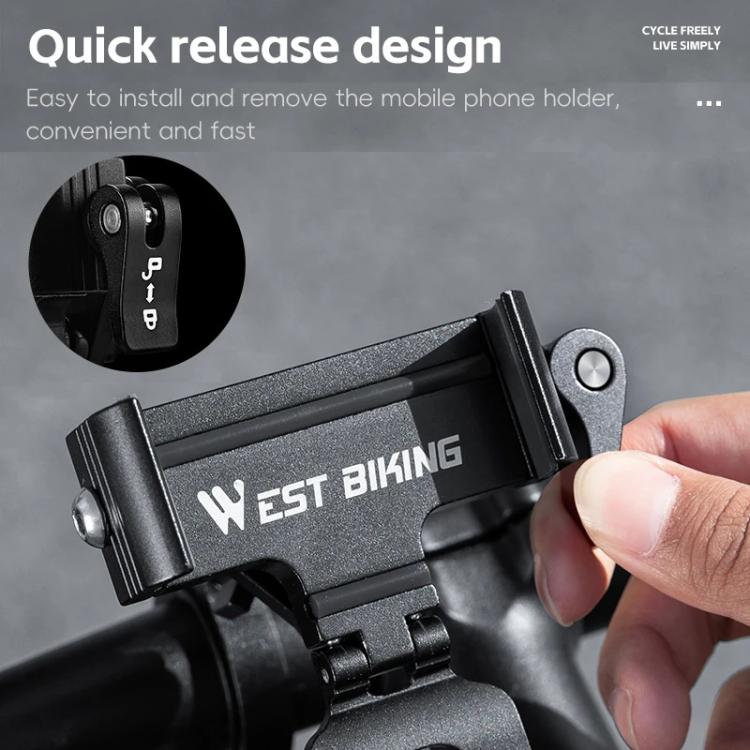 Bicycle phone mount quick-release cradle; hand operates the removal tab