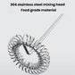 Stainless steel mixing whisk for electric milk frother, tightly coiled.