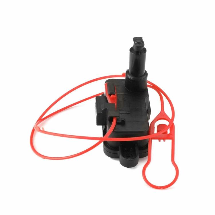 Fuel cap release lock actuator with black body and red electrical lead