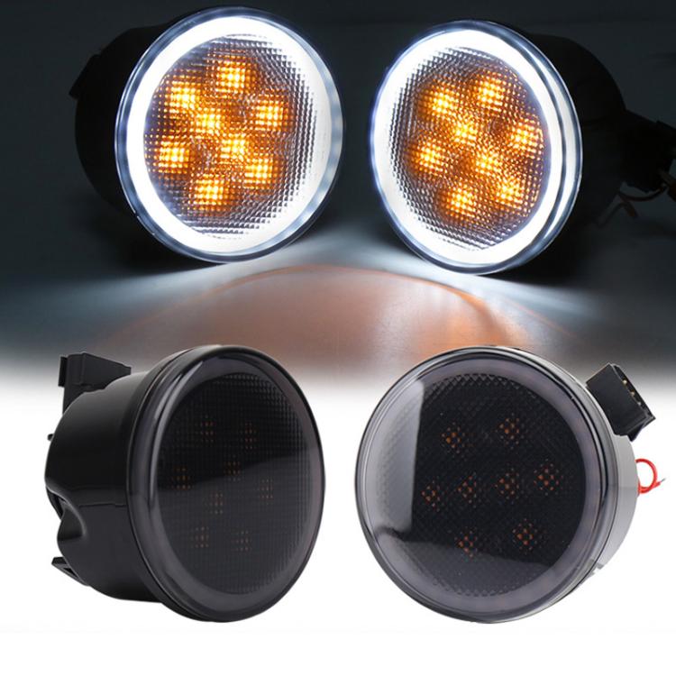 Pair of amber LED grille turn signal lights with circular clear lens and chrome ring