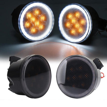 Pair of amber LED grille turn signal lights with circular clear lens and chrome ring
