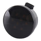 LED grille turn signal light close-up: amber dot pattern lens in black rim