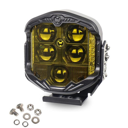 7-inch LED work light with yellow lens, rugged black housing, and side mounting nuts