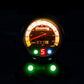 Backlit motorcycle speedometer with amber dial, green gear light, and blue indicator