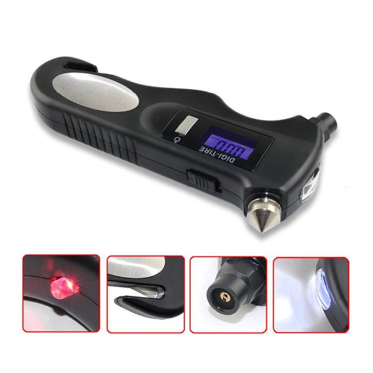 Handheld digital tire pressure gauge pressing on car tire tread, black
