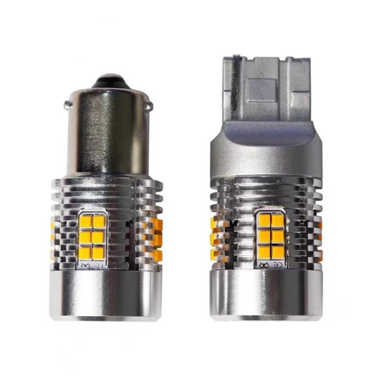 Pair of LED turn signal bulbs with fan heatsinks and yellow chip LED panels