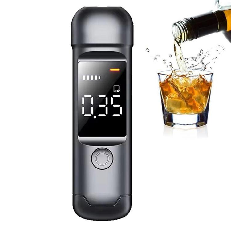 Portable breath alcohol tester with dark blue display showing mg/100ml reading