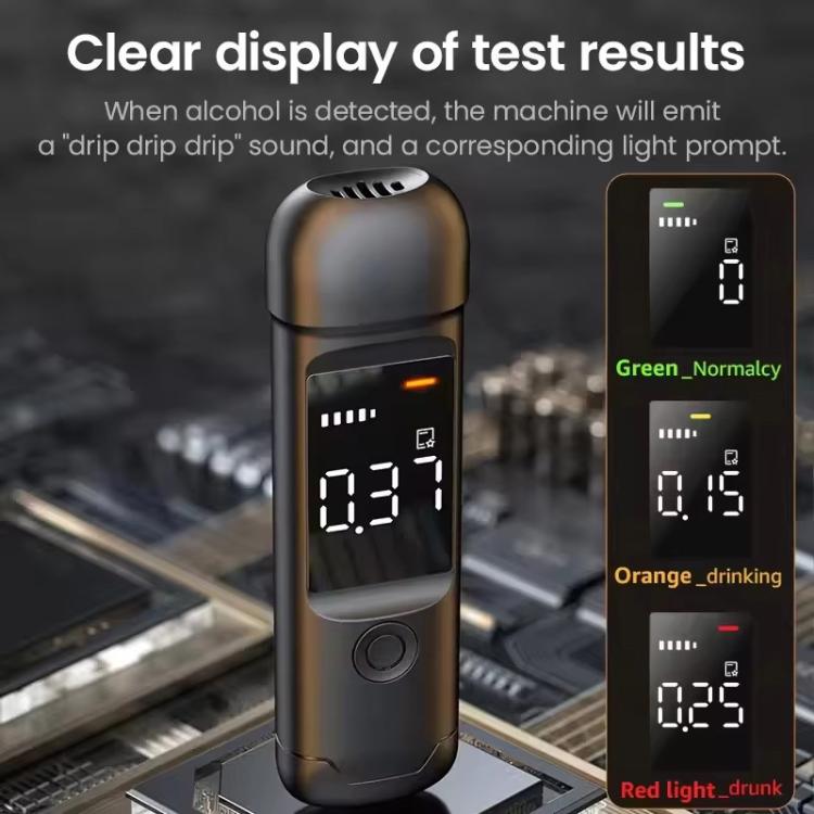 Portable breath alcohol tester with clear display showing a test value on screen