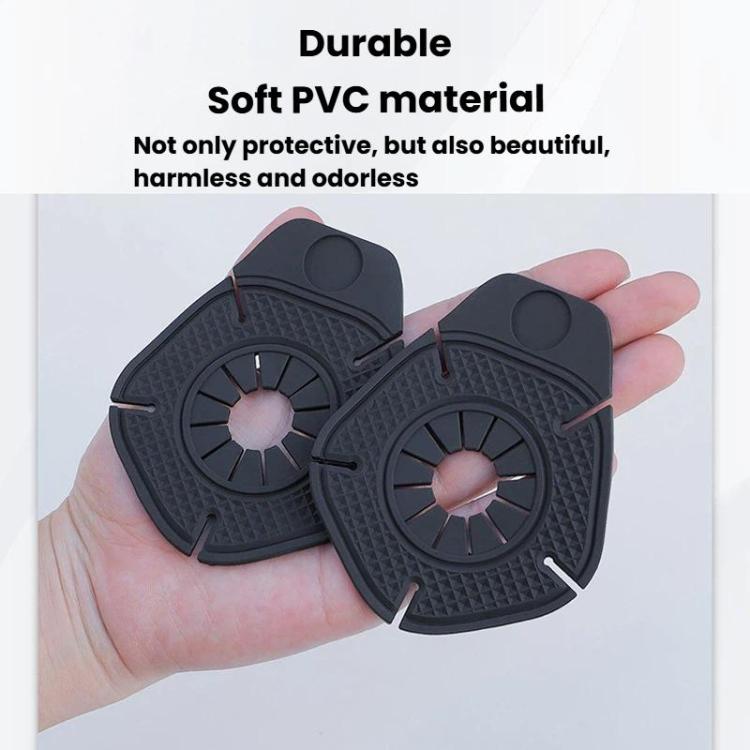 Set of 10 black flexible wiper hole protective covers in hand