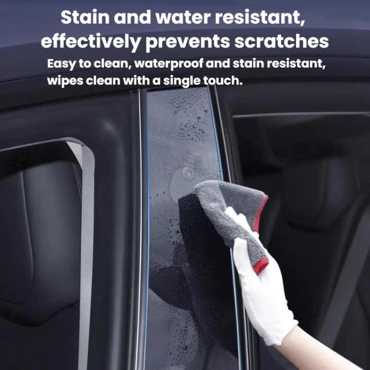 Car B-pillar protective film on vehicle pillar with cloth wiping the surface clean