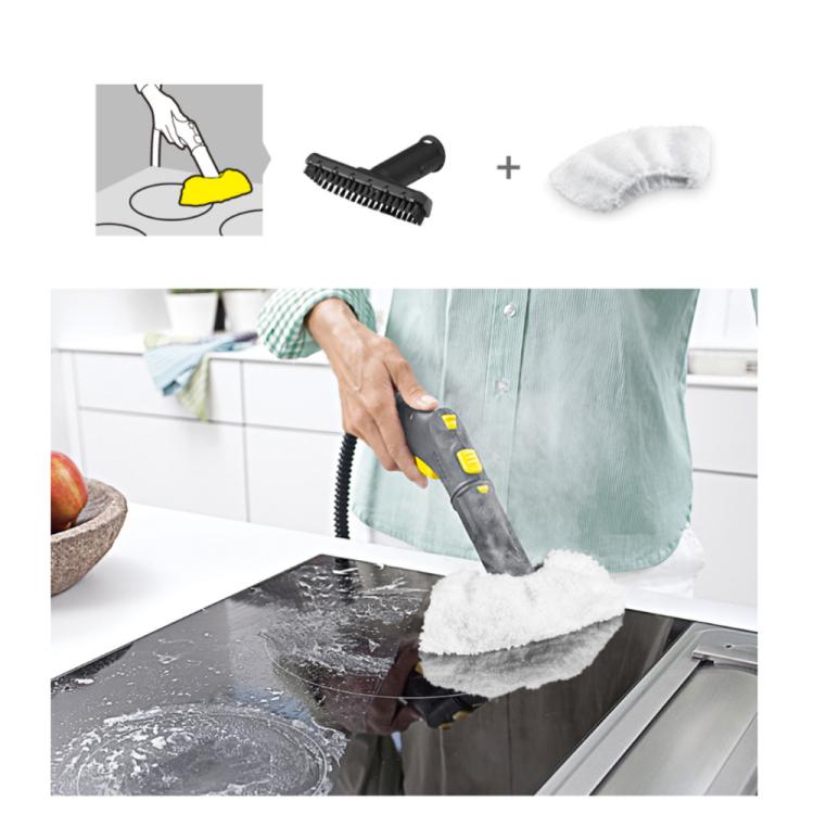 Steam cleaner brush head with white microfiber pad in use with handheld unit