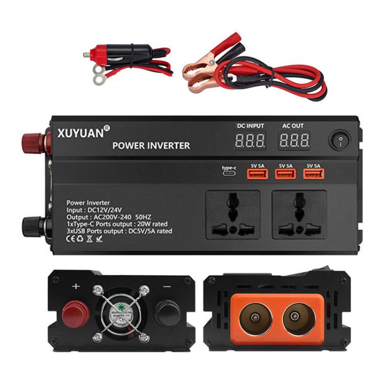 Black car power inverter showing digital readout, USB ports, and dual orange AC sockets