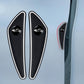 Black car mirror corner protectors with white borders, two applied on door edge