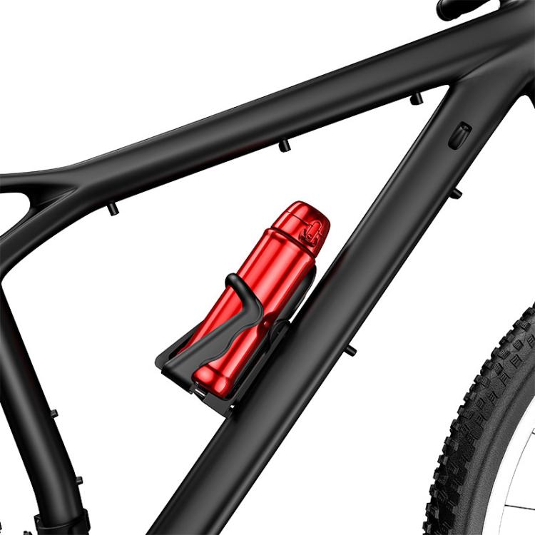 Black bike drink holder attached to frame with red bottle cage insert