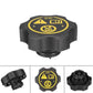 Black radiator cap top view with yellow safety label and vent