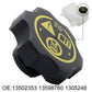 Black radiator cap with yellow warning label, angled view