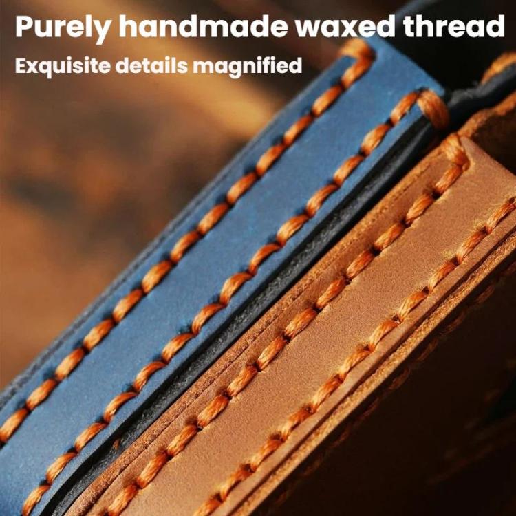 Close-up of blue and brown genuine leather key cover with waxed thread stitching