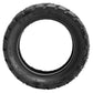 Black off-road scooter tire with thick tread blocks and raised center ribs