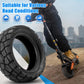 Black off-road scooter tire mounted on scooter, rugged tread for rough surfaces