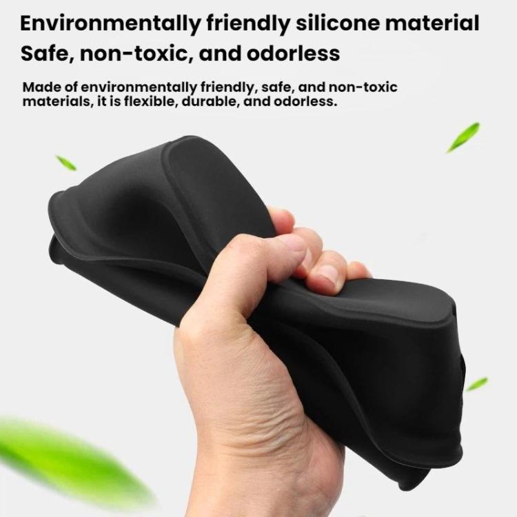 Black silicone bottle holder with flexible molded design, held in hand