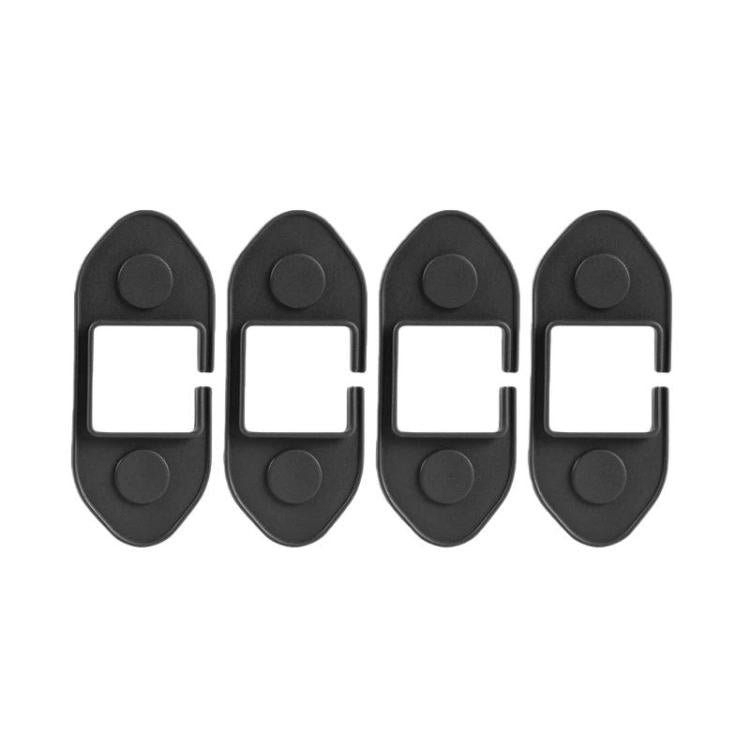 Set of four black silicone door limiter covers with end circles and square opening.