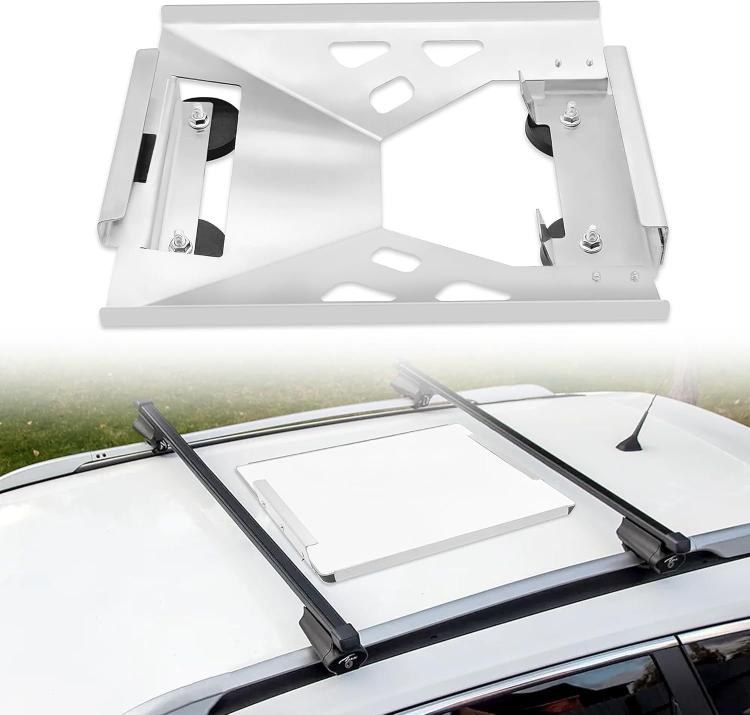 White magnetic roof installation bracket with mounting arms on a car roof