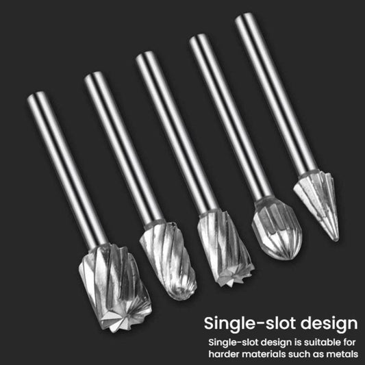 Close-up of multiple rotary burr tips on silver metal shanks