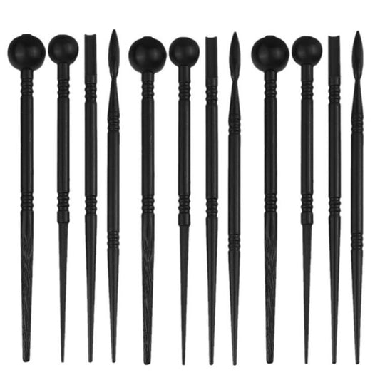 Set of black pottery sculpting pens with rounded tips and long textured handles
