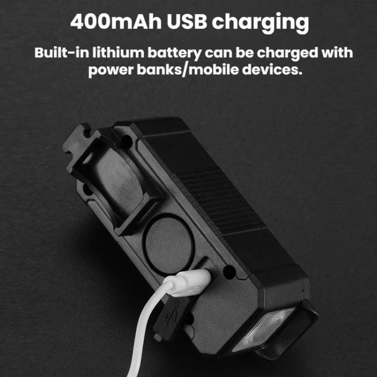 Black bicycle headlight with USB charging cable connected to the side port