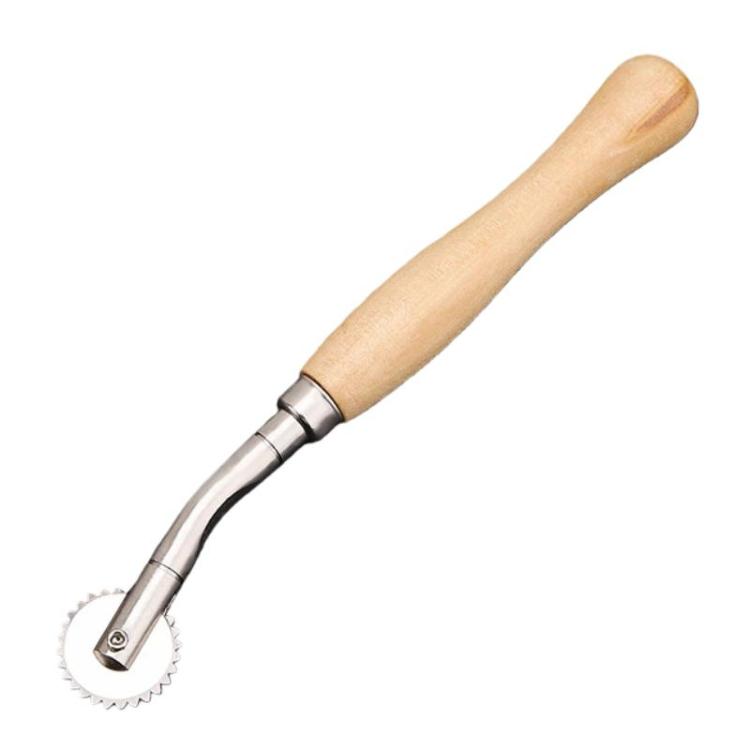 Leather marking wheel tool with serrated roller and light wood handle, close view