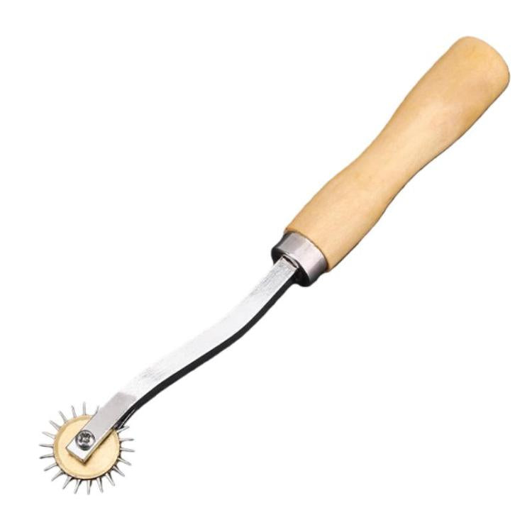 Leather marking wheel tool with serrated roller and light wood handle, curved frame