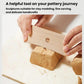 Wooden pottery sculpting tool for carving clay blocks, with finger-hole design