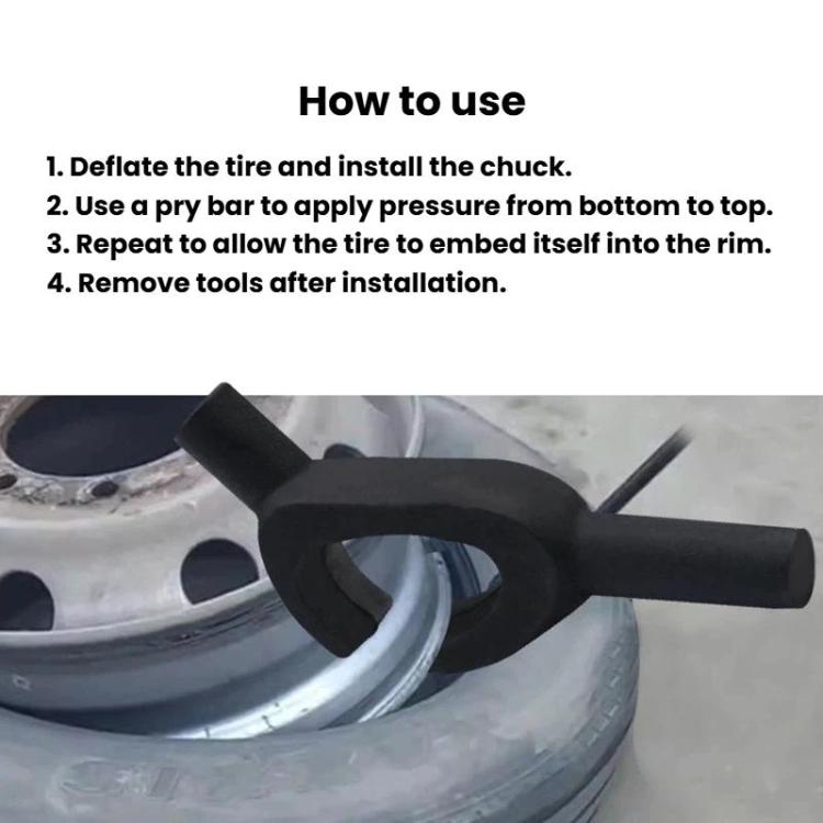 Black tire bead breaker tool prying a tire off the wheel rim