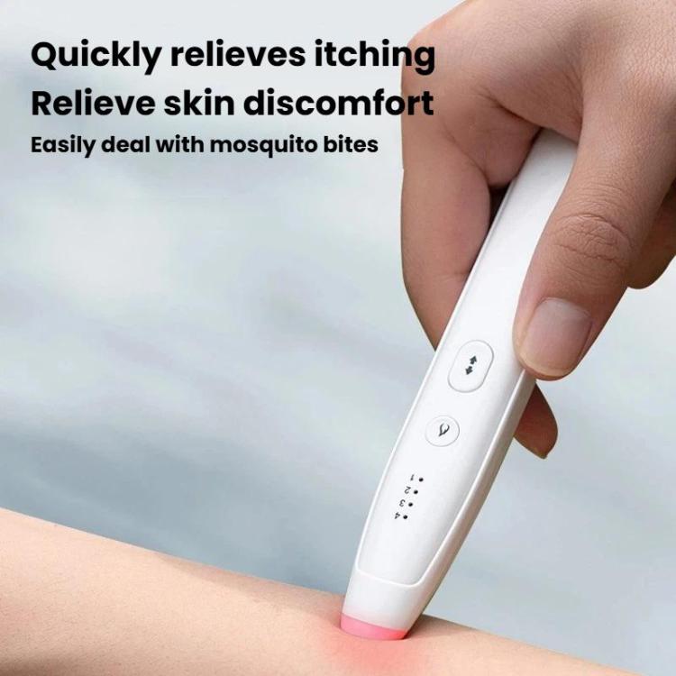 Infrared anti-itch pen pressed to skin with glowing pink heating tip