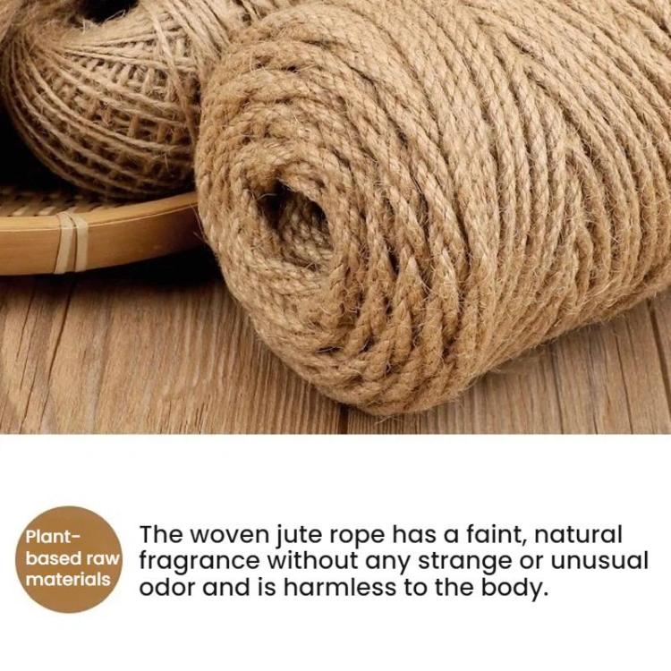 Close-up of tan woven hemp rope coil end on wood surface for crafting