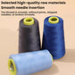 Blue and gray fine polyester sewing thread spools with light-blue spool in front