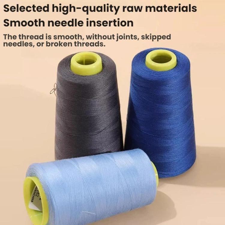 Blue and gray fine polyester sewing thread spools with light-blue spool in front