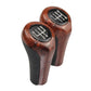 Two-piece wood-grain gear shift knob set, dark brown with black sides