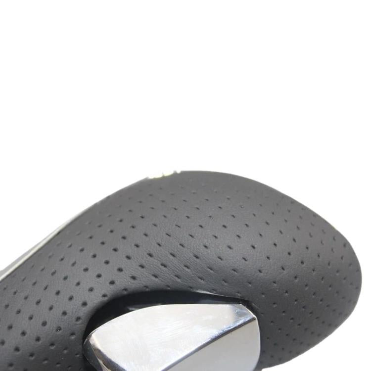 Perforated black leather gear shift knob grip with chrome insert