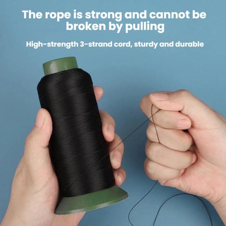 Nylon sewing thread spool with loose thread line held between hands.