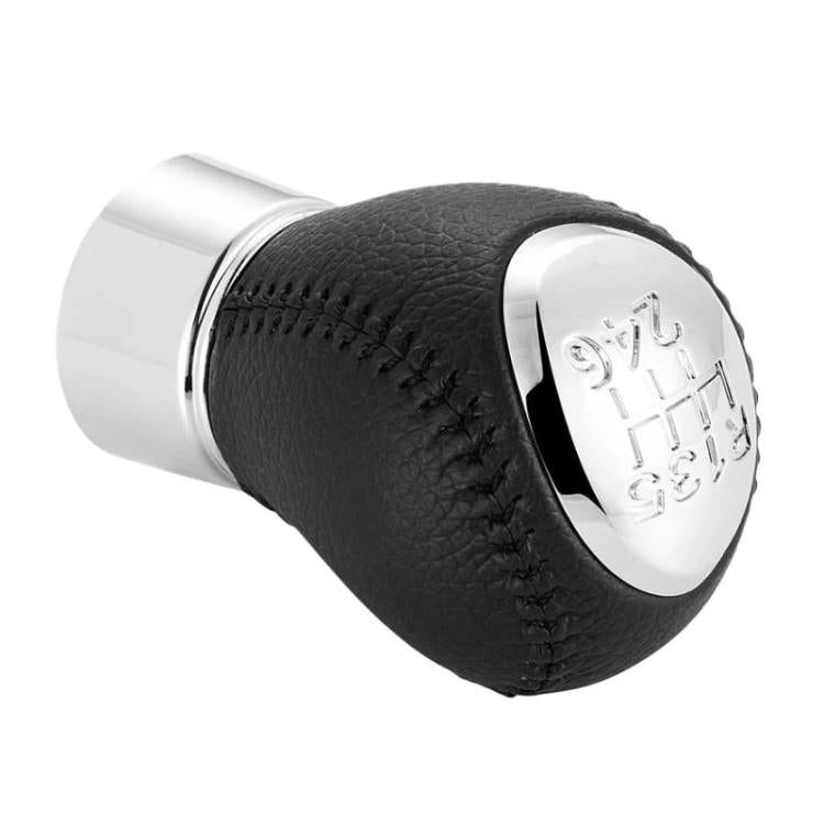 Black leather-look gear shift knob with chrome ring and side view of shift insert