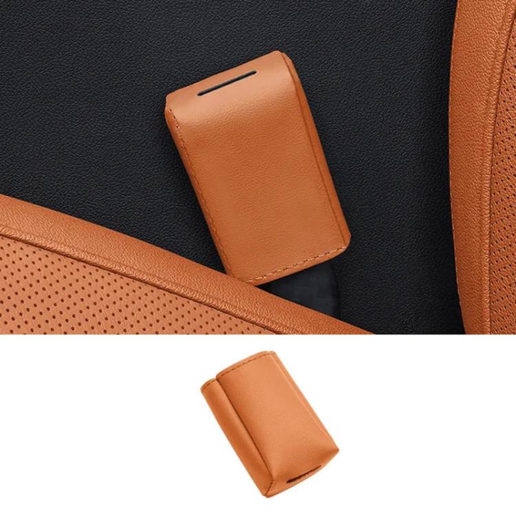 Orange leather car seat belt buckle protector cover for car seat belt buckle.
