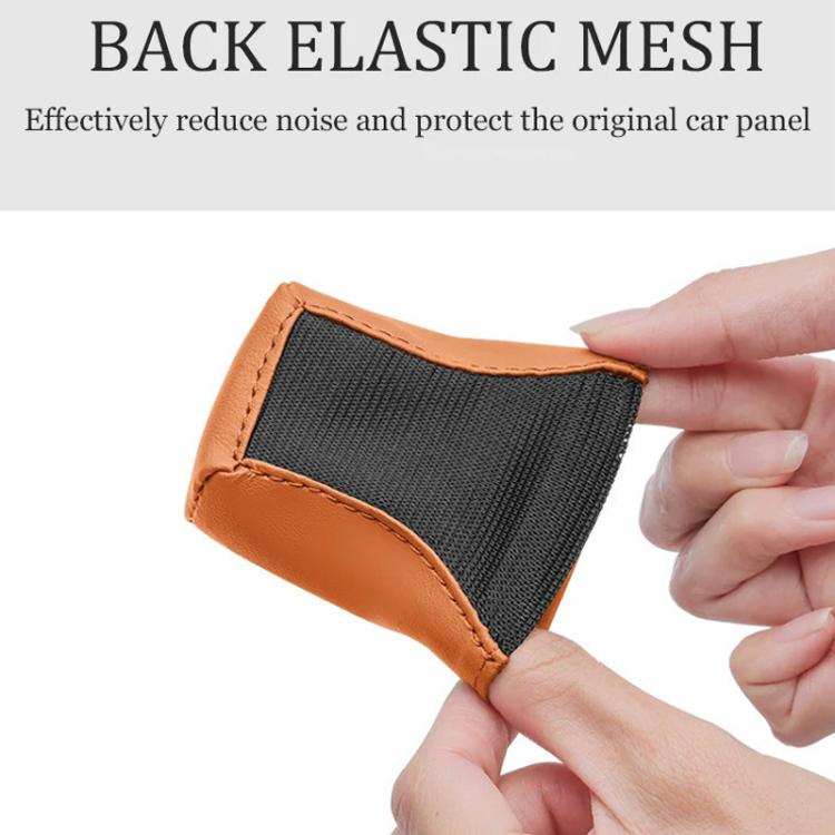 Orange leather car seat belt buckle protector with black elastic mesh back.