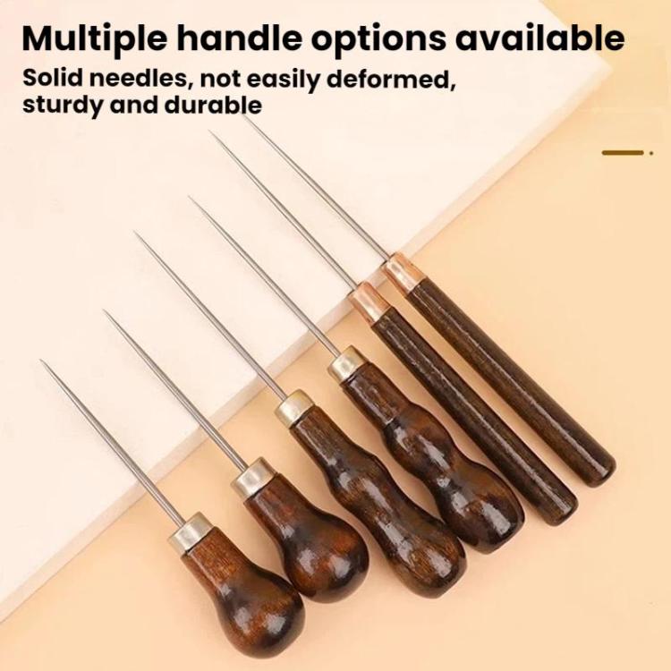 Multiple leather repair awls with dark wooden handles and straight steel needles