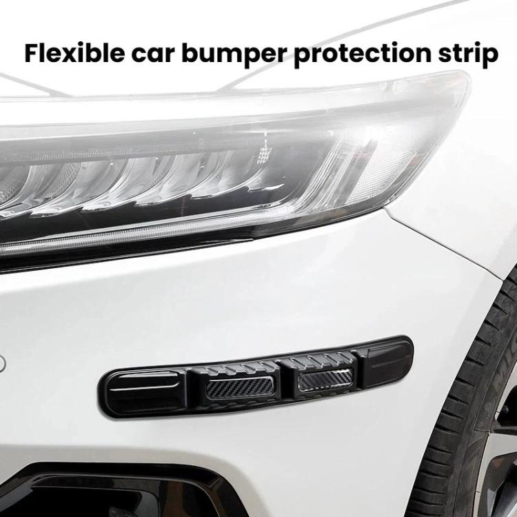 Black flexible bumper protection strip with raised grooves and textured panels.