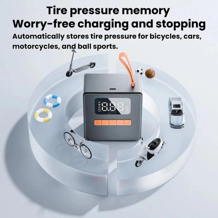 Digital tire inflator base unit with LCD screen, orange handle, and connected accessories