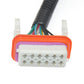 HID headlight wiring harness multi-pin plug with orange housing and visible contacts